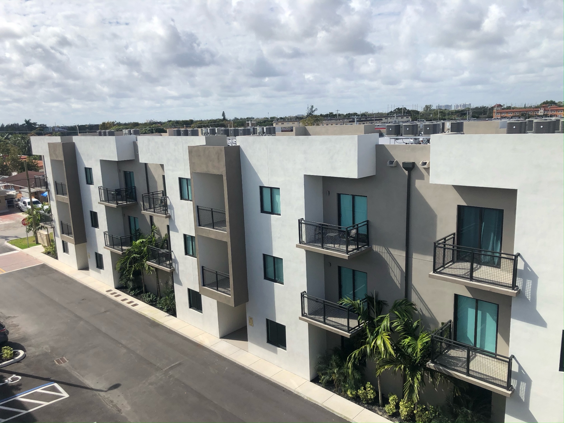 Mint12 LLC multifamily investment property in Hialeah, Florida — three-story apartment building